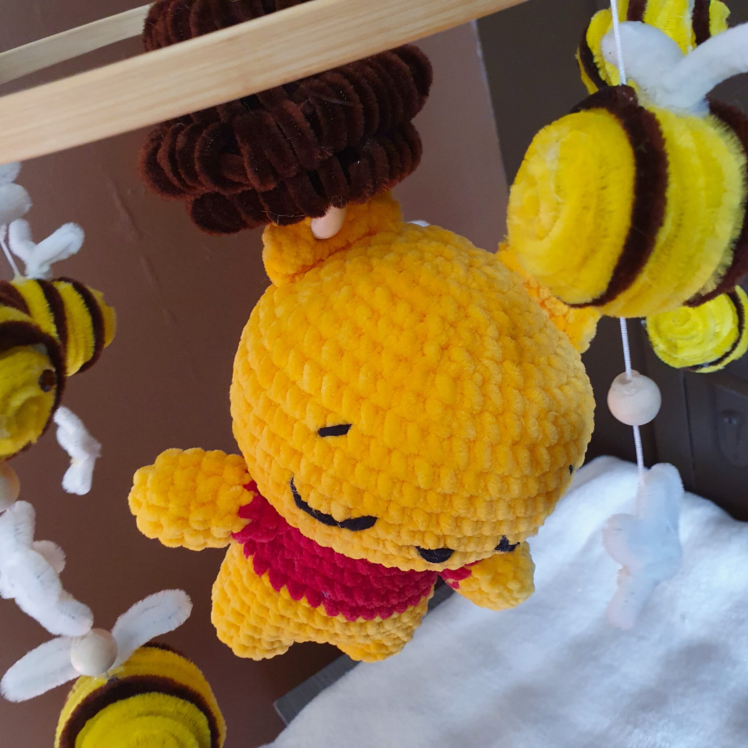 zoom sur winnie accroché à son mobile